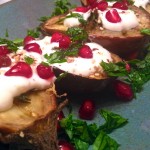 roasted eggplants with thyme, garlic yogurt sauce, and pomegranate arils