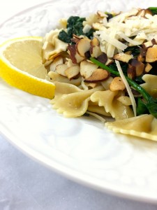 spinach lemon pasta with toasted almonds closeup :: by radish*rose