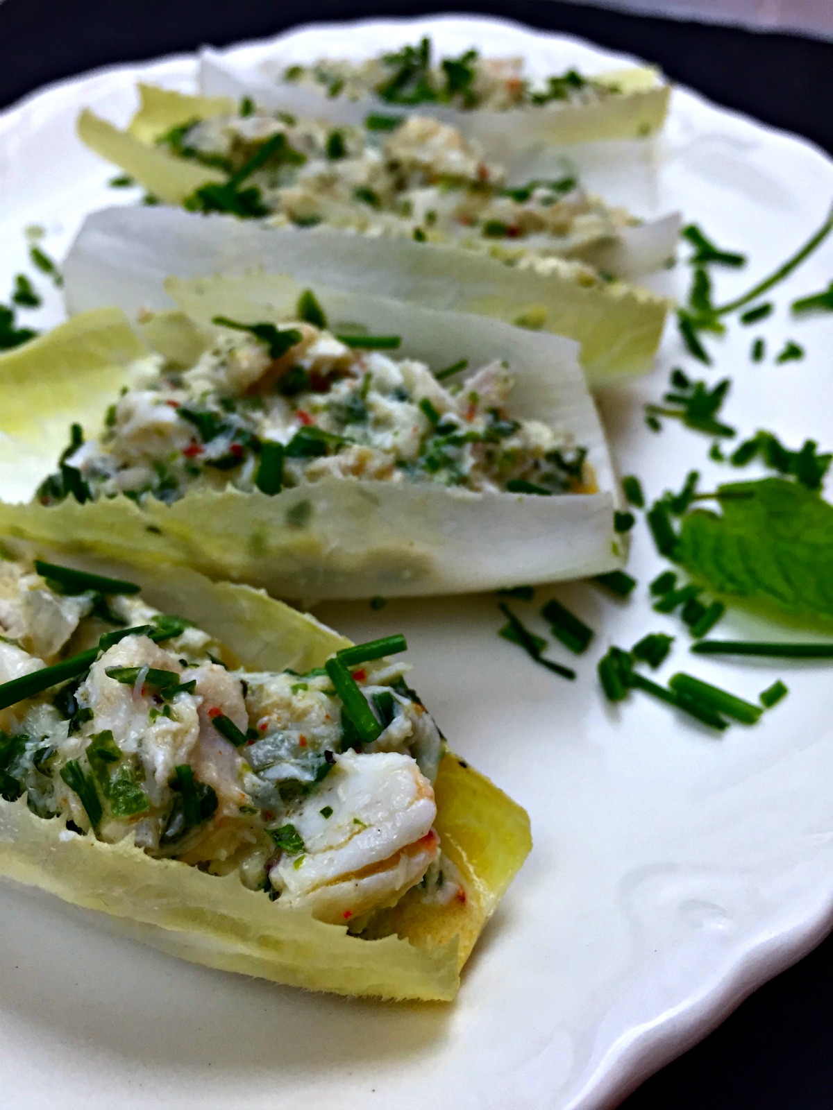 crab salad with lime, mint, and chives on endive :: by radish*rose